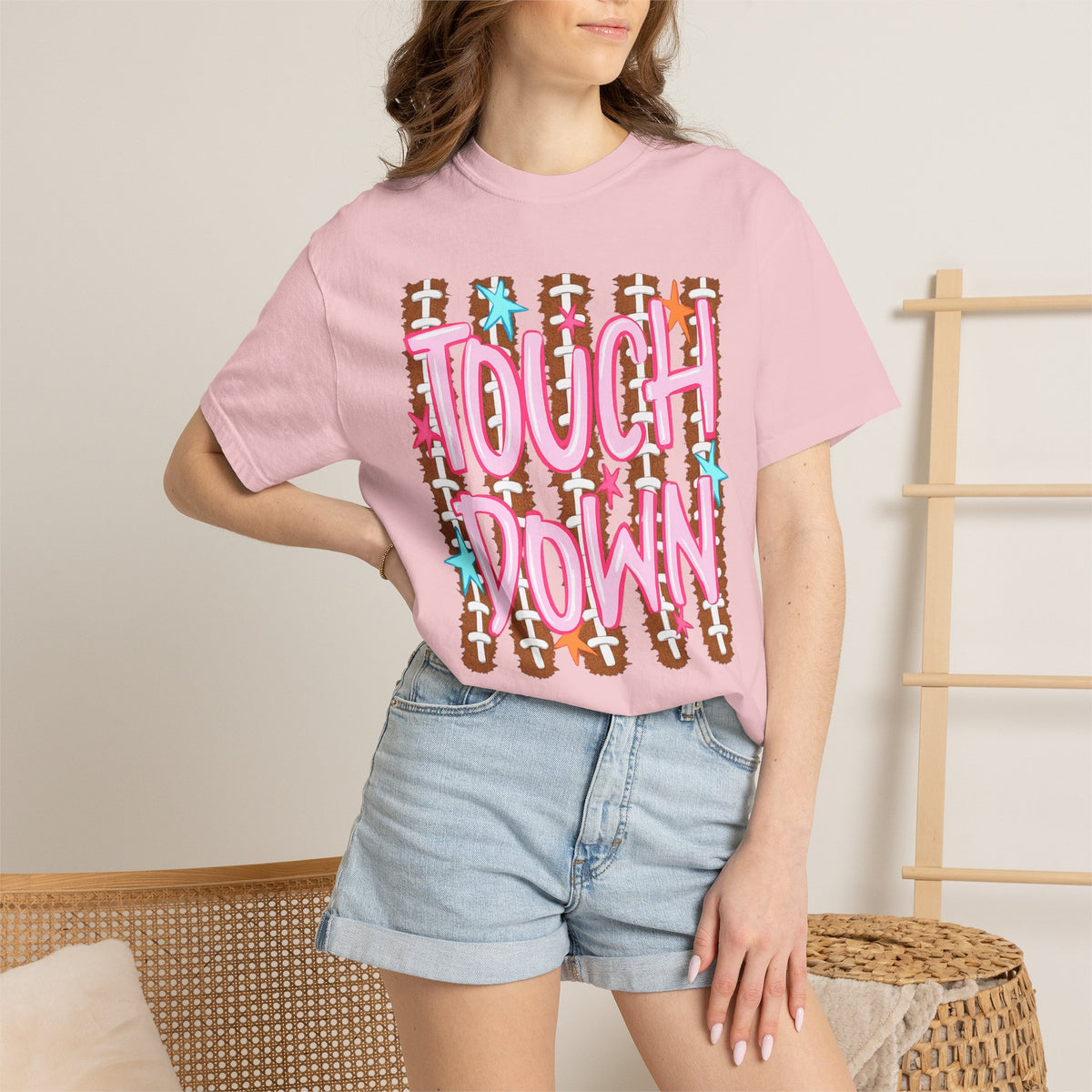 Touchdown Football Graphic T-Shirt — Retro Pink Script & Football Field Design
