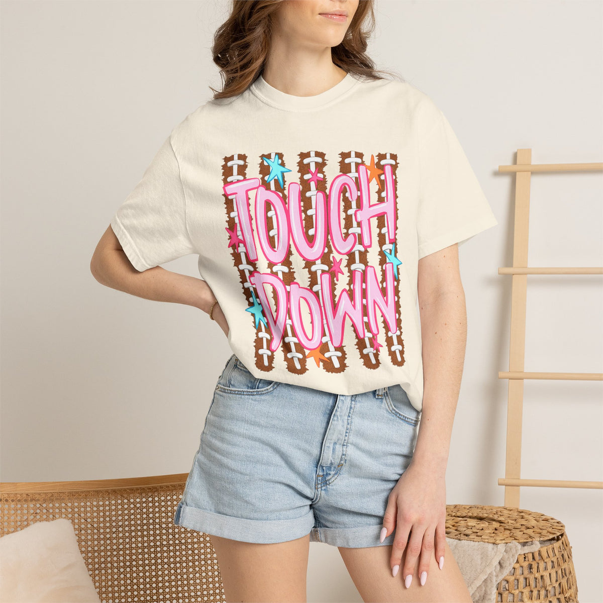 Touchdown Football Graphic T-Shirt — Retro Pink Script & Football Field Design